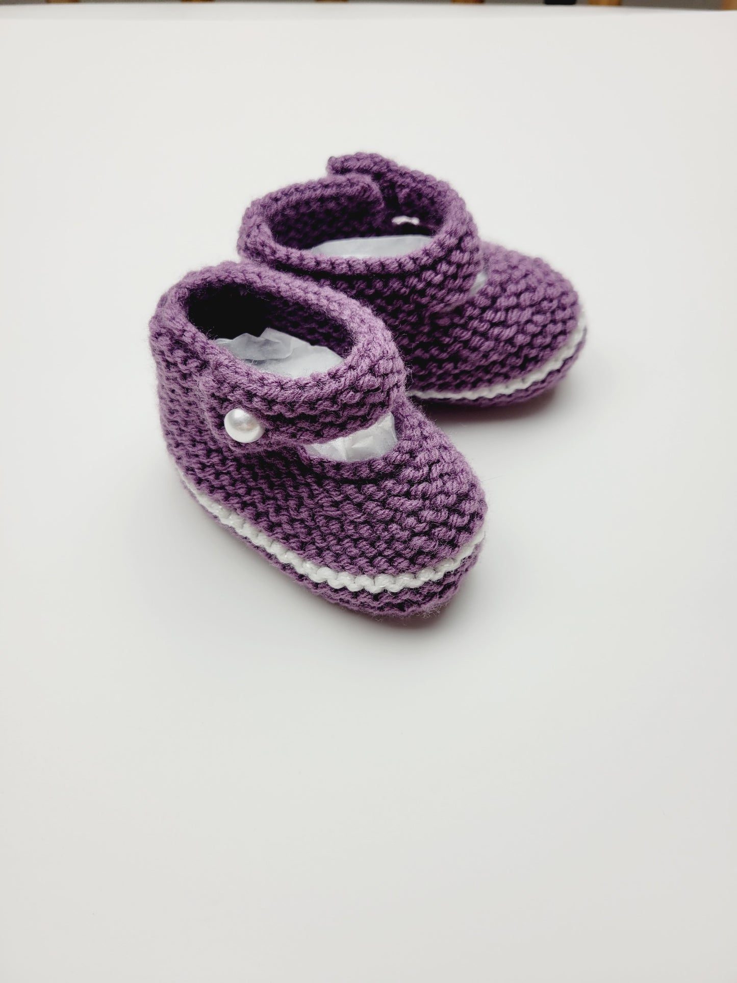 Hand knitted baby slippers