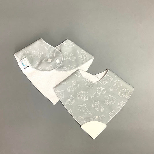 White elephant teething bib on gray background
