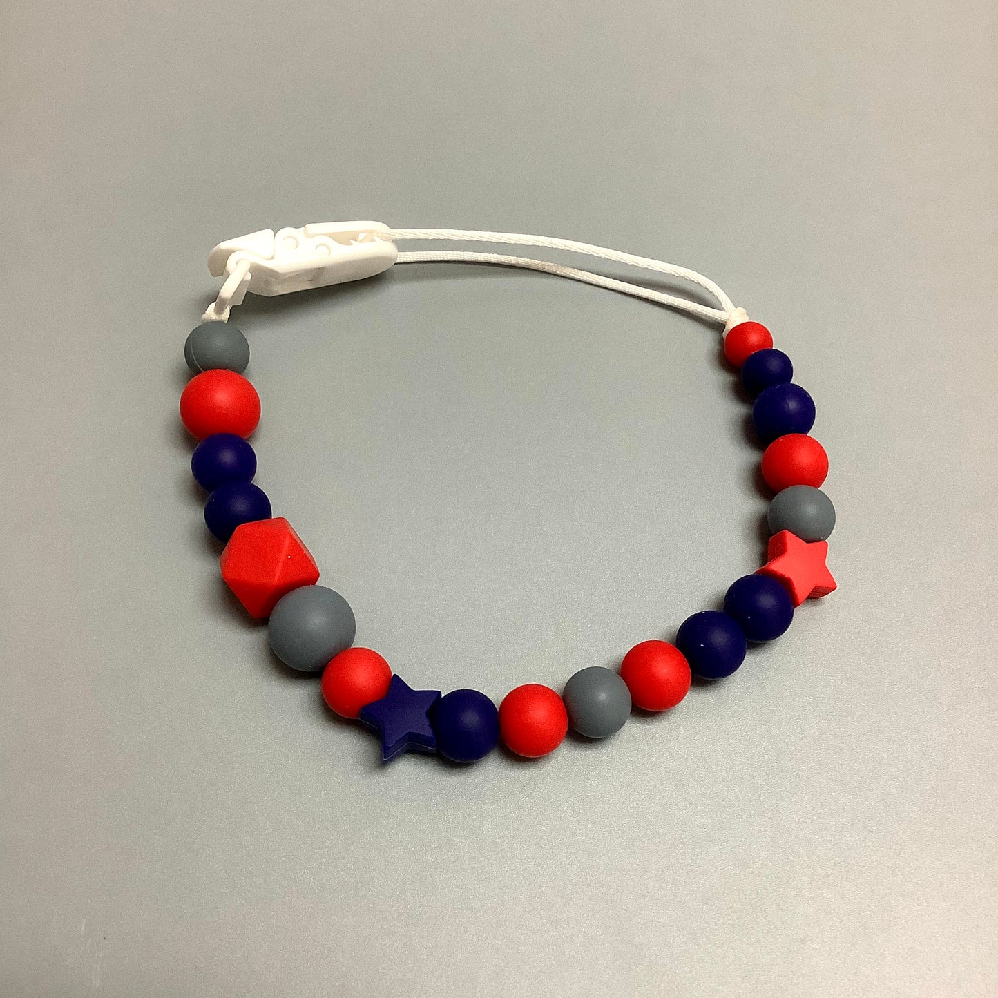Attache-suce en silicone - Rouge et marine