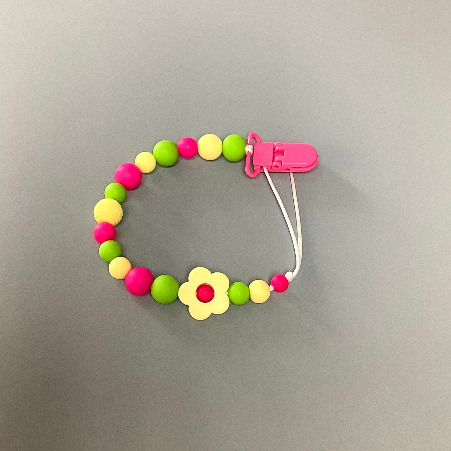 Attache-suce en silicone - Fleur jaune et billes rose