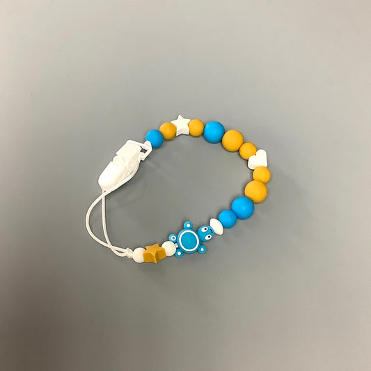 Silicone pacifier clip - Blue turtle and yellow balls